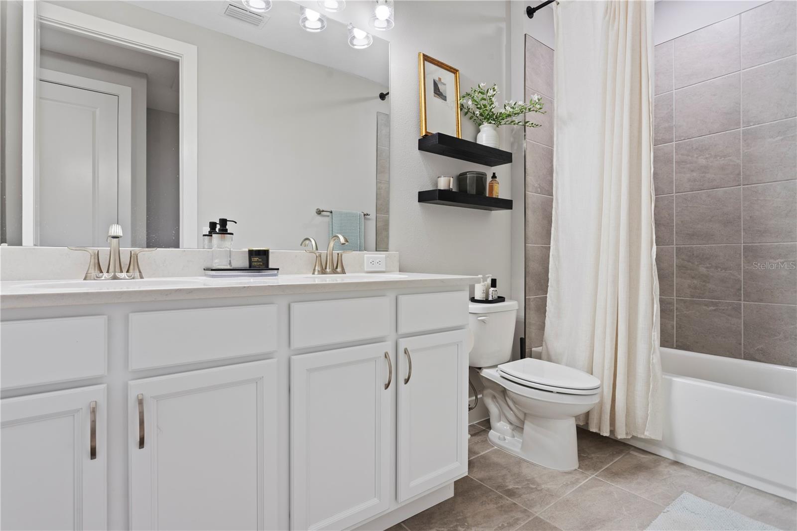 Secondary full bath upstairs.