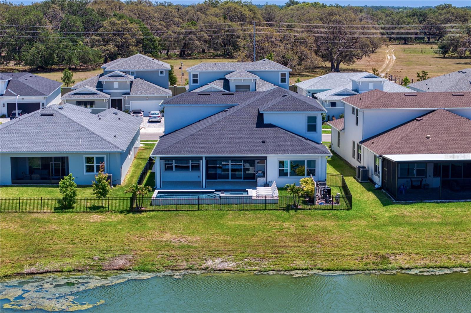 Use your pool in complete privacy with fenced backyard.