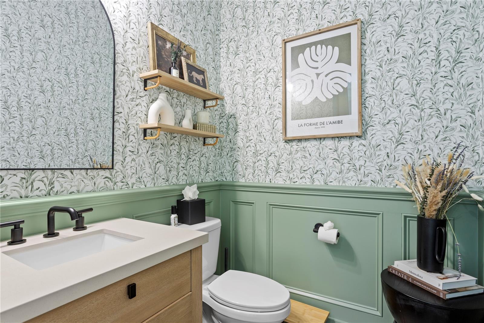 Stylish half bath located near the main living area.