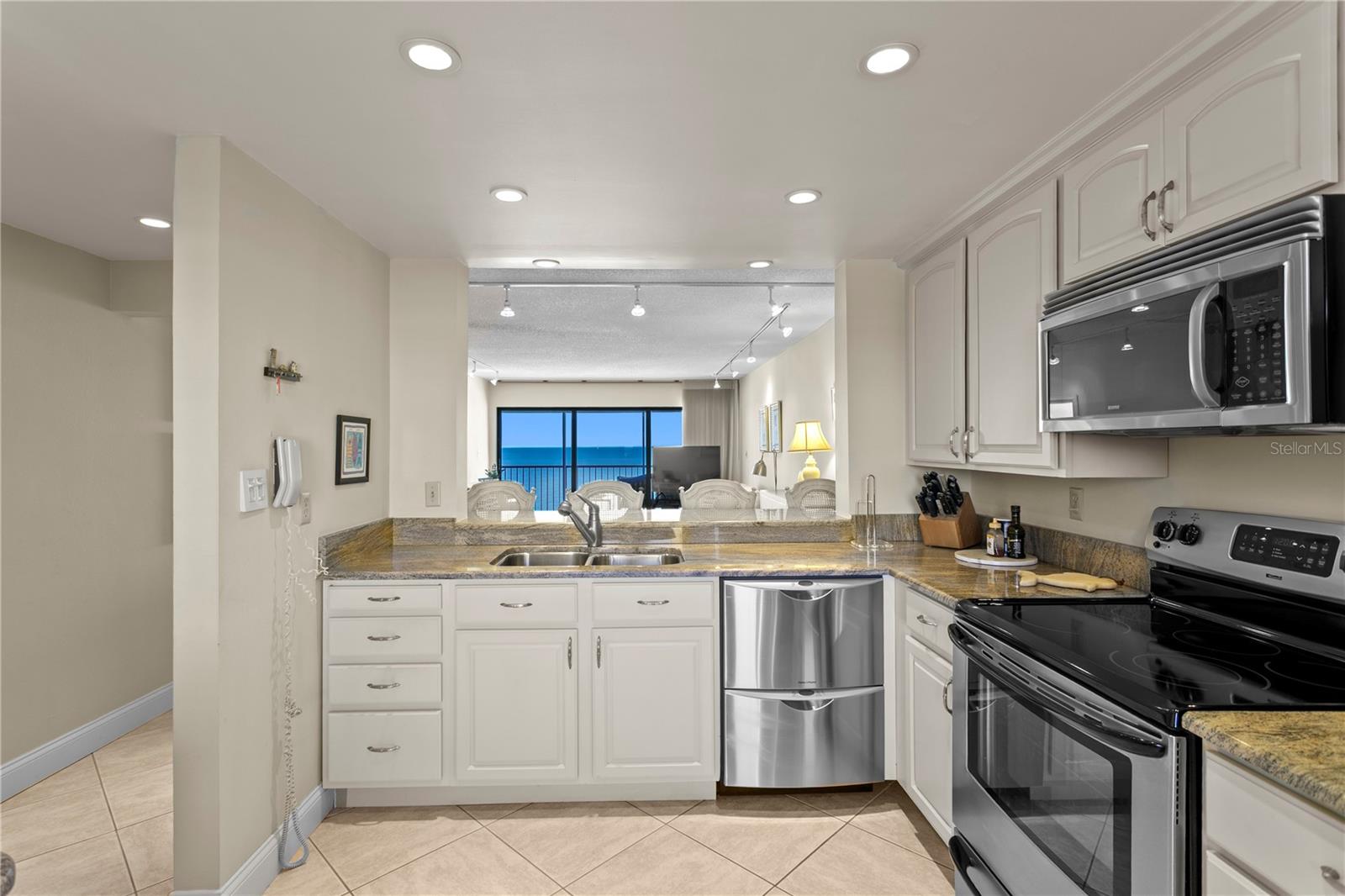 From the moment you step inside, you’re greeted by sweeping views of the Gulf that immediately set the tone for relaxed coastal living.