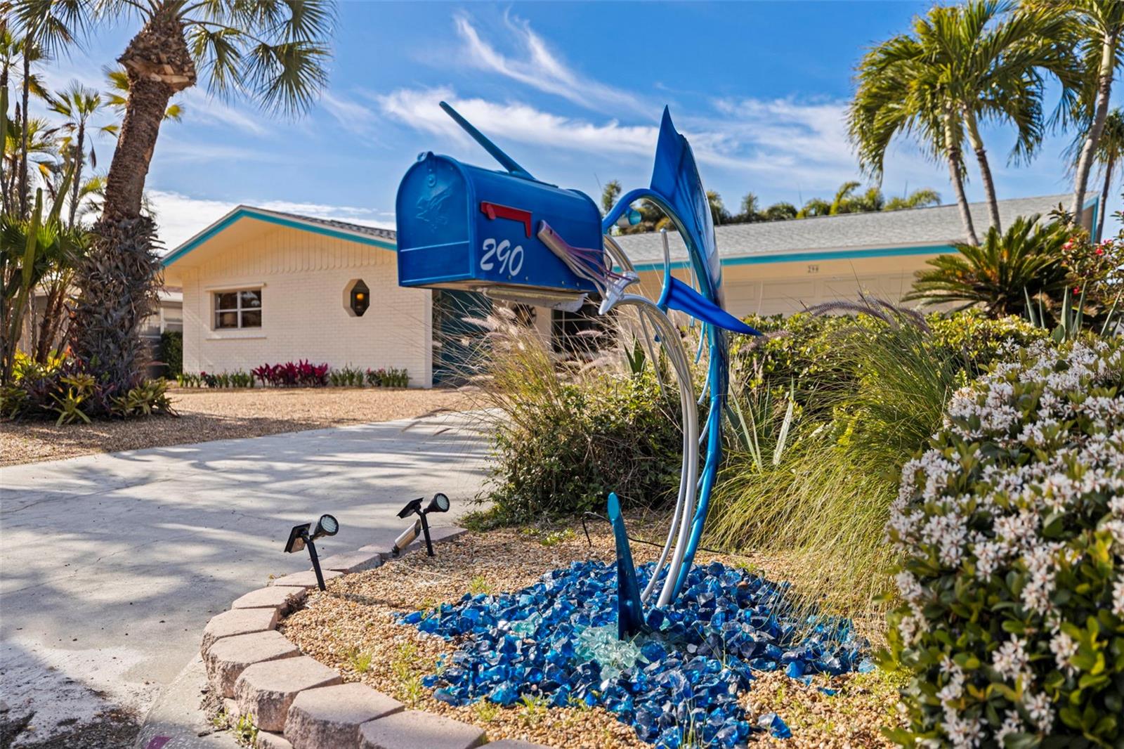 Mid-Century modern style with an iconic custom designed mailbox.