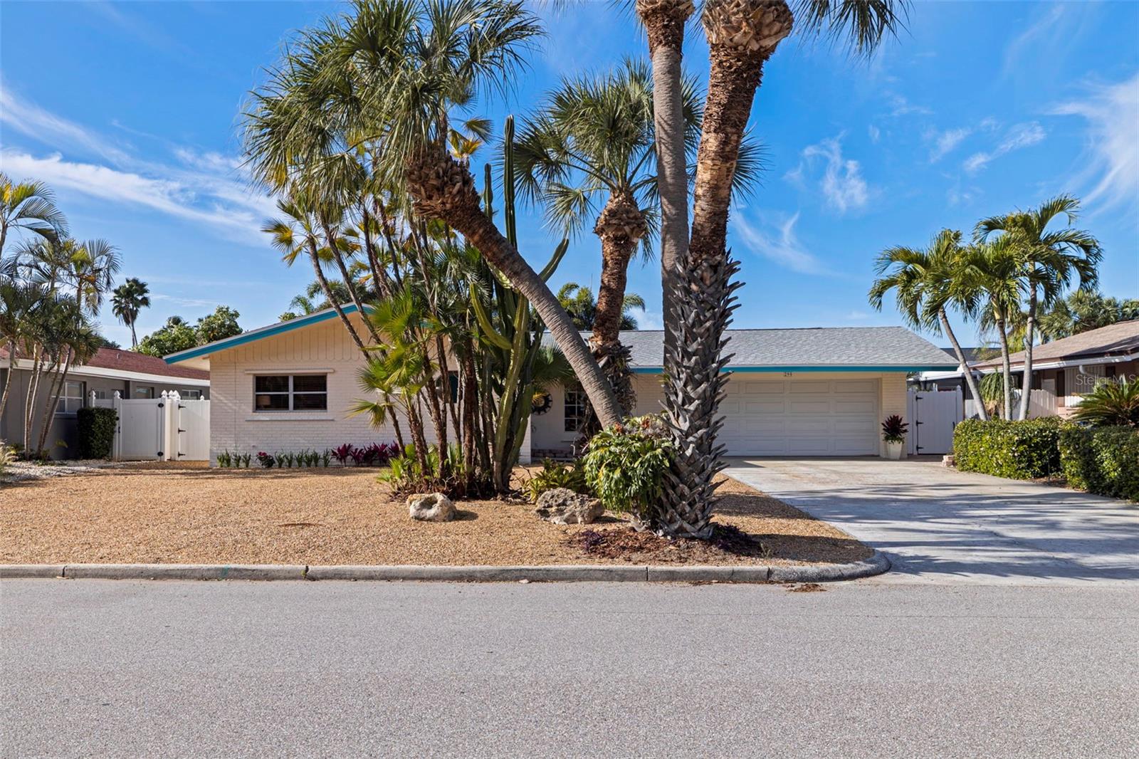 1st St W is one of the friendliest, most dog-walking neighborhoods on the island!