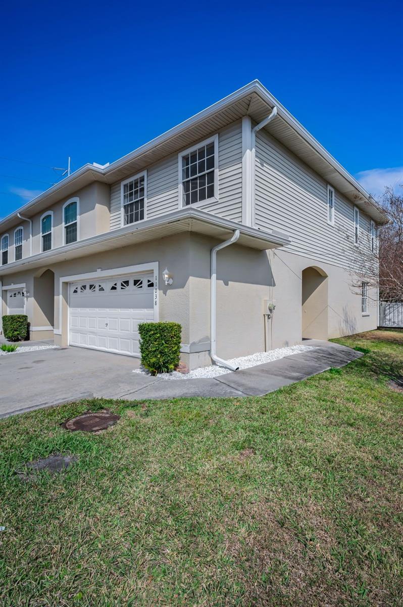 Situated on a desirable corner lot, this property offers extra privacy and a quiet setting.