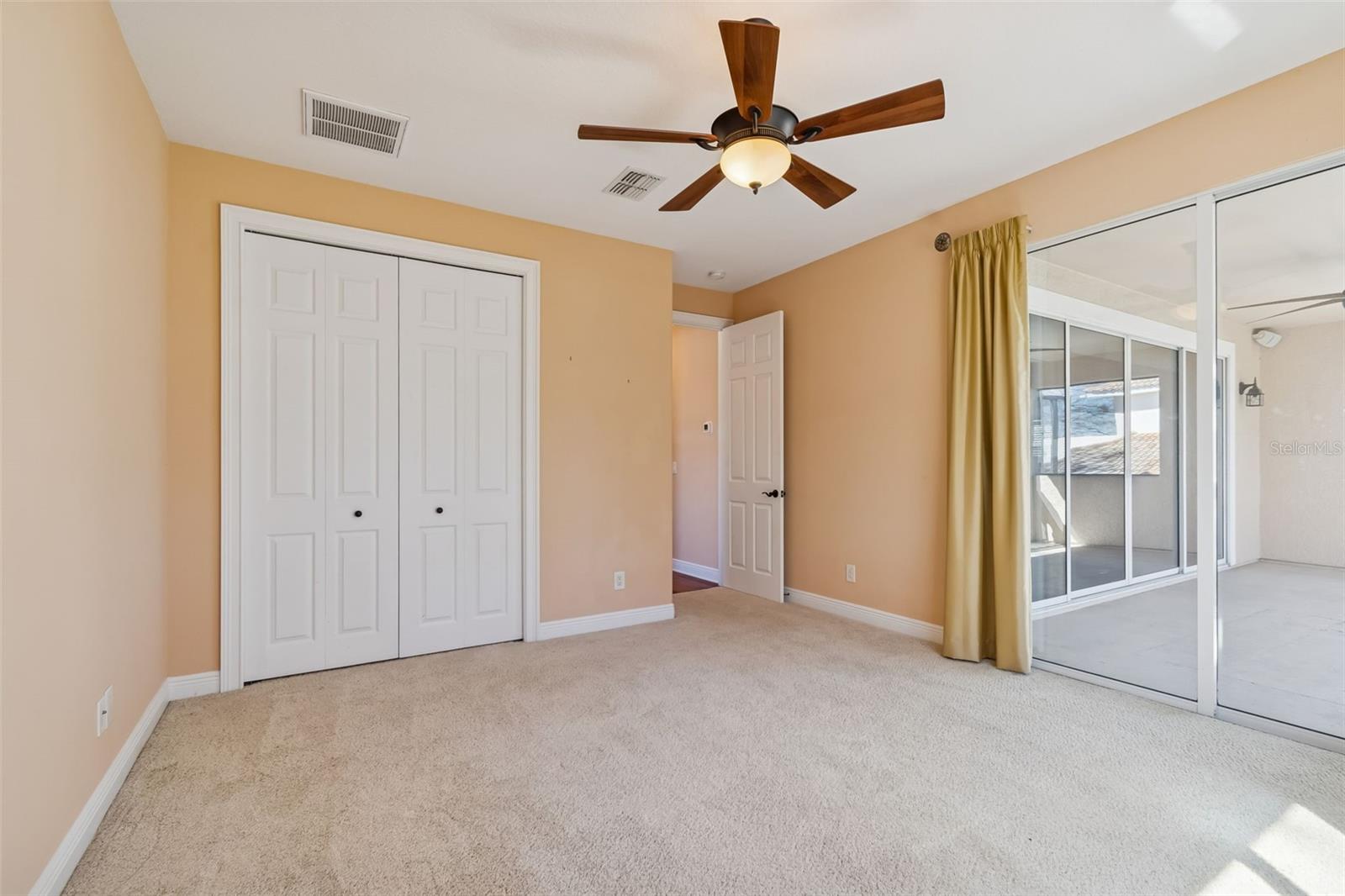 Bedroom 2 with upper balcony access