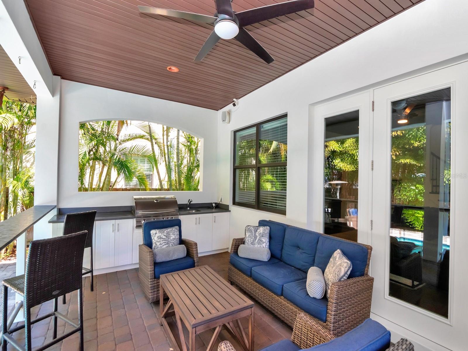 Under roof roomy lanai and outdoor kitchen