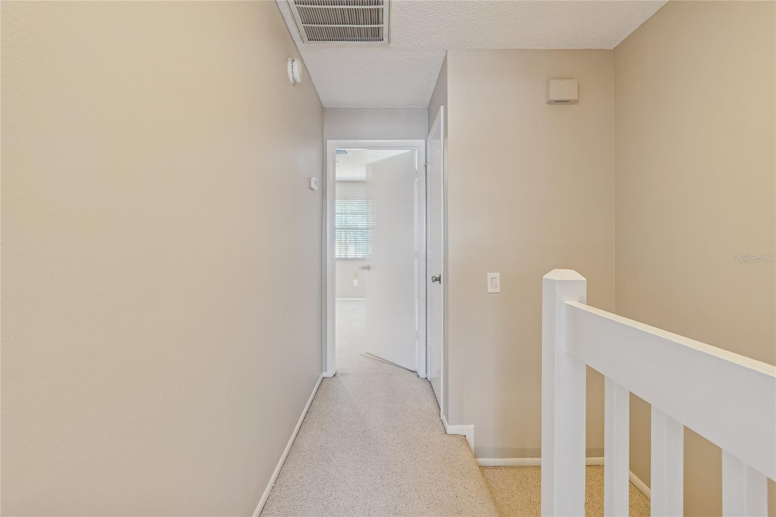 Top of Stairs looking into Primary Suite