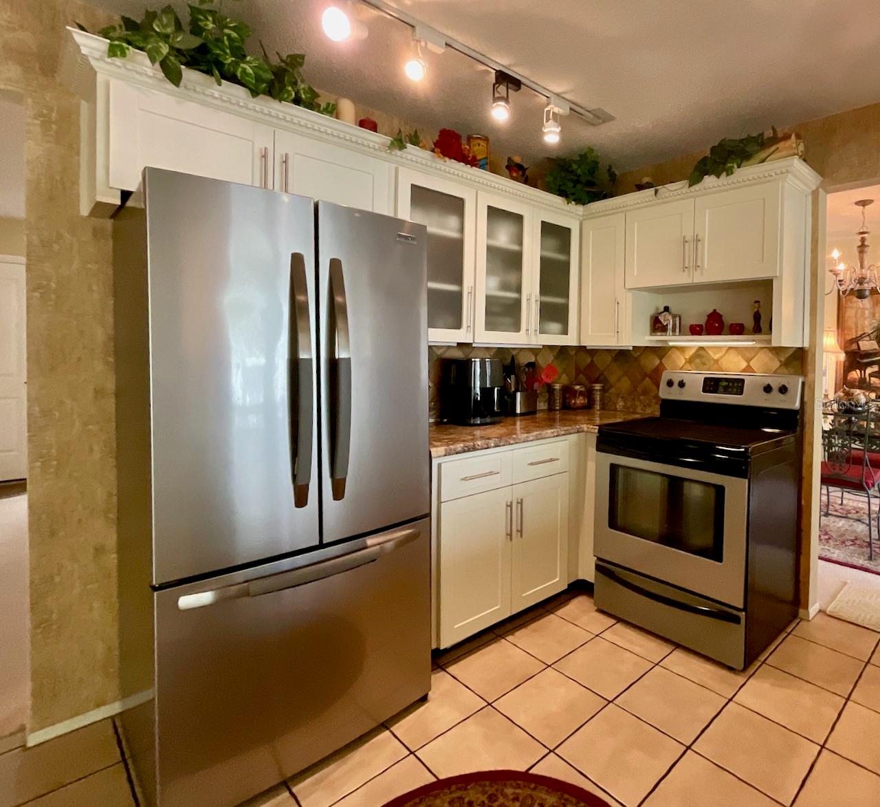 9-Kitchen refrigeratrator and range area