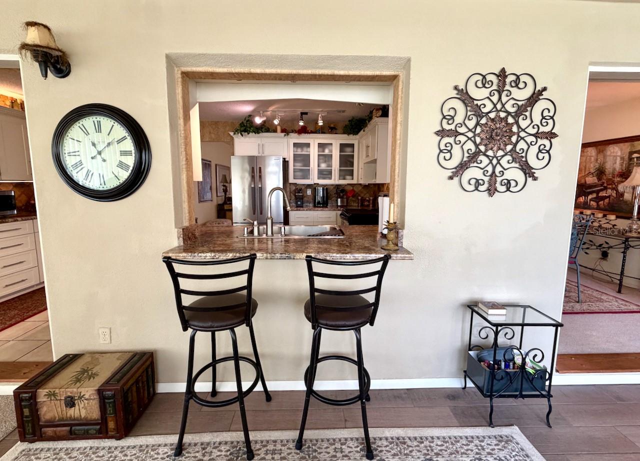 16-Family room breakfast bar view to kitchen