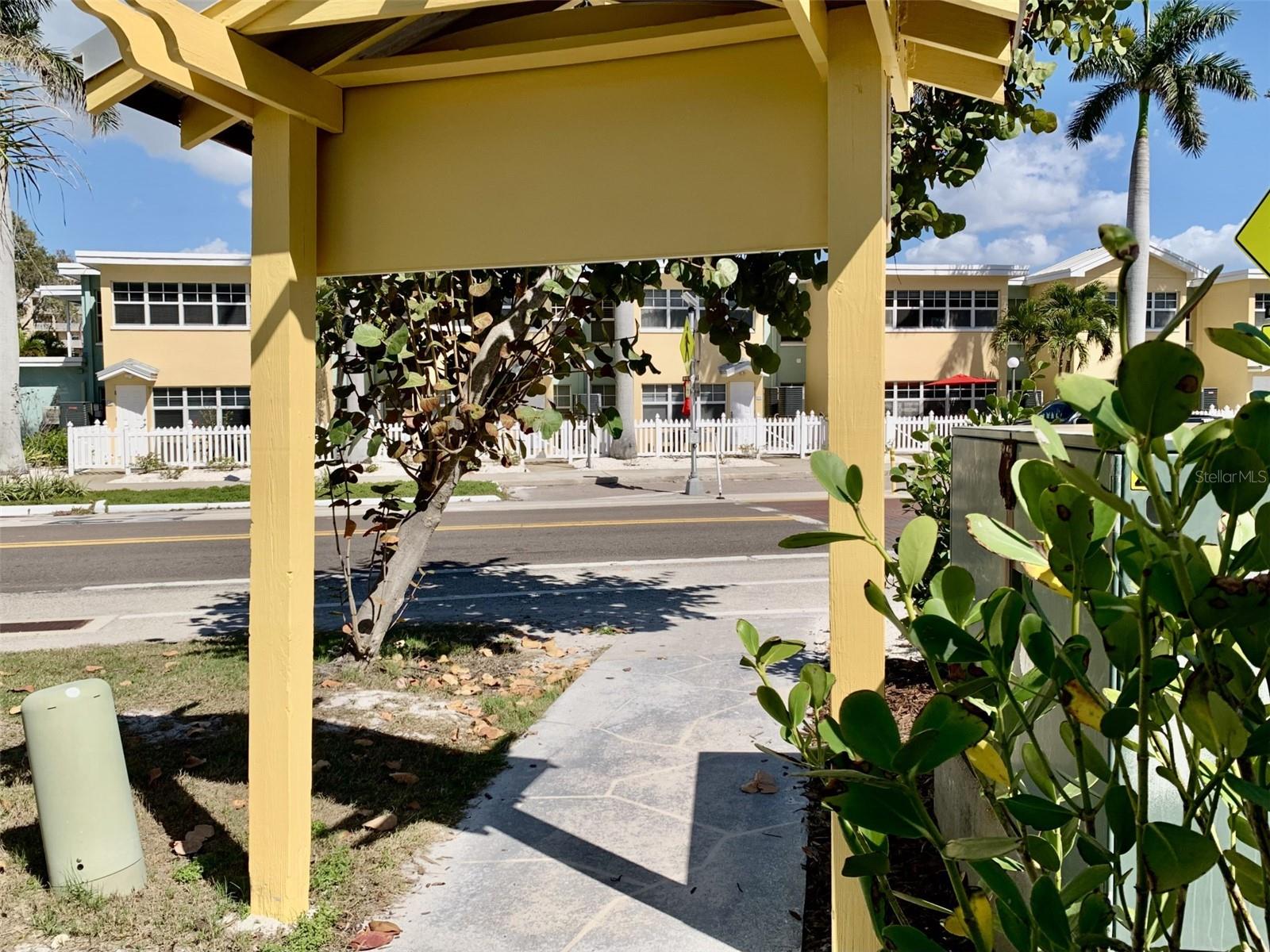 The deeded beach access is directly across the street from Barefoot Beach Resort