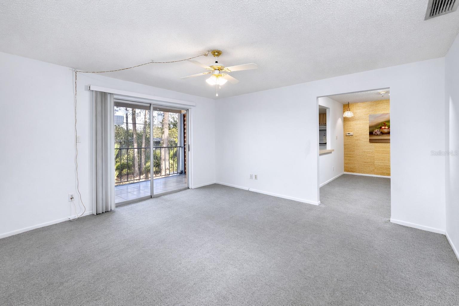 Large living room with access to large balcony