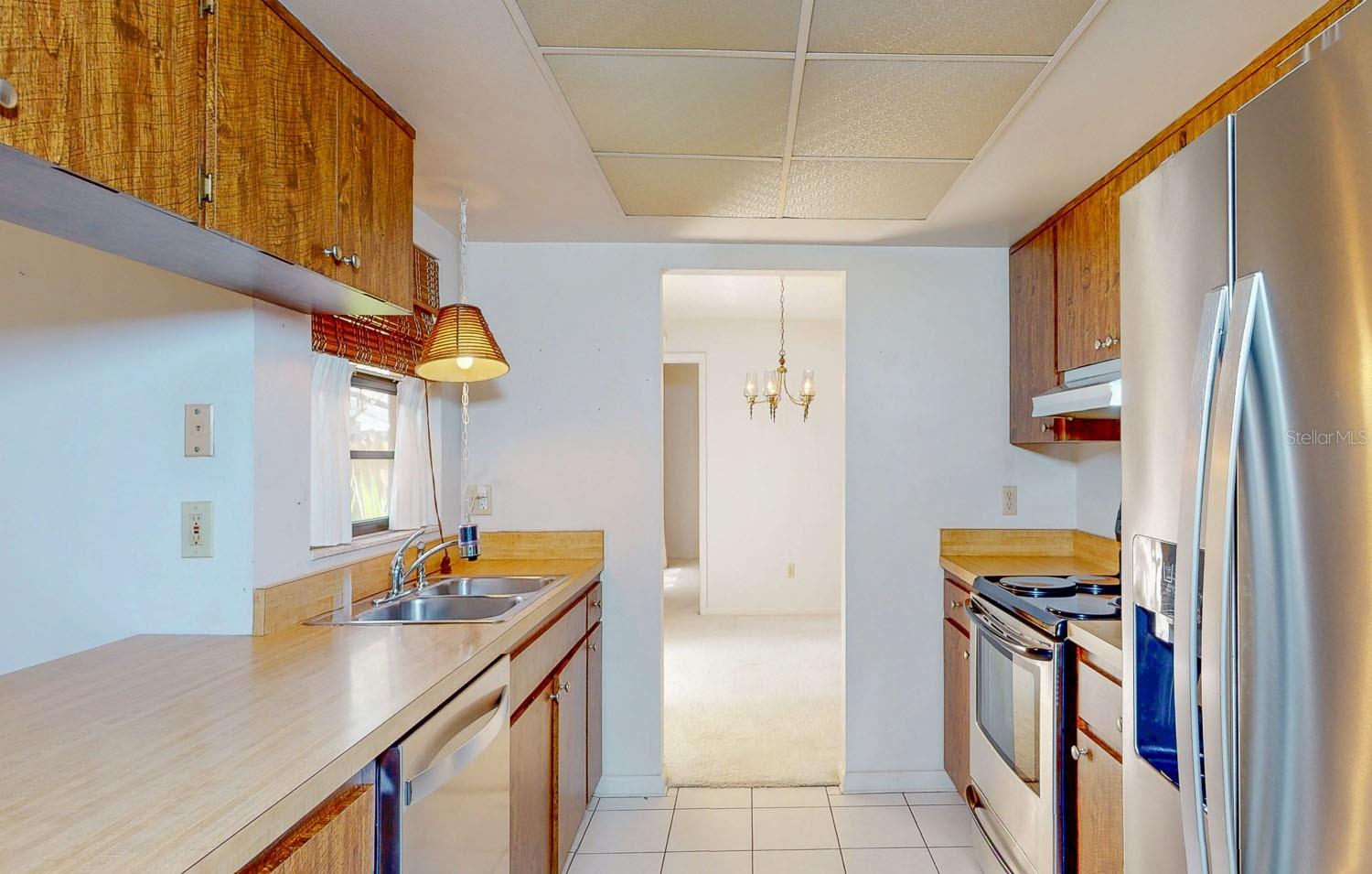 Kitchen with easy dining room and family room access centrally located in the home.