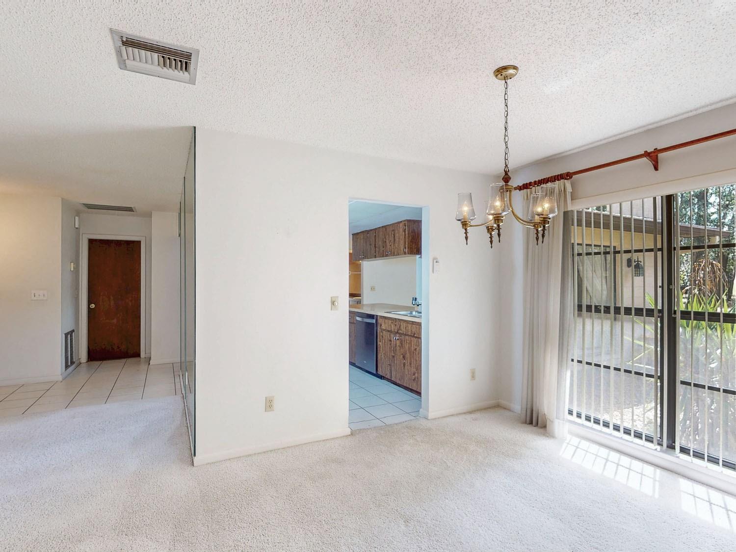 Light filled dining area with easy flow to the kitchen