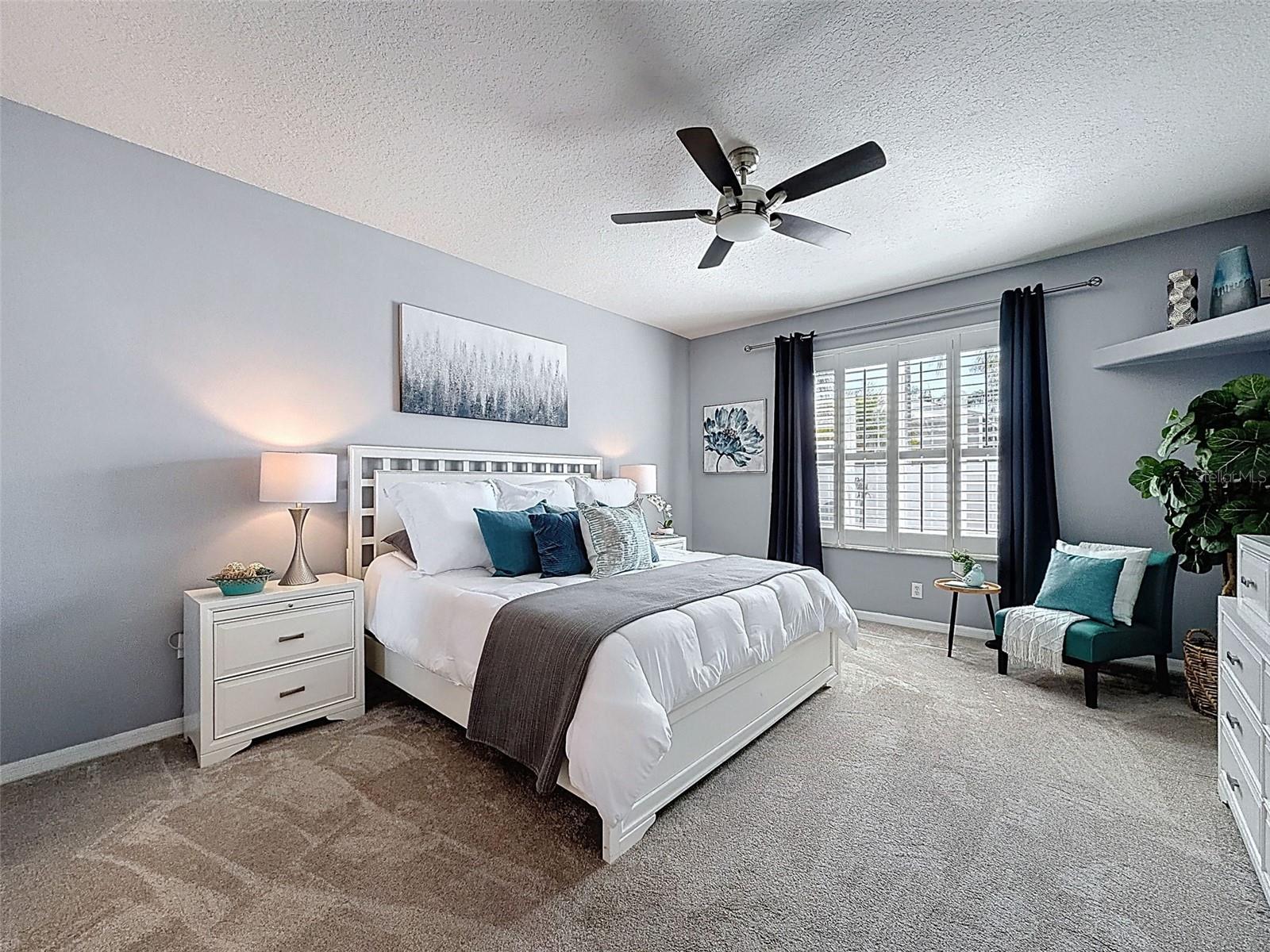 Private master bedroom with views to the back yard.  New carpet and plenty of room.