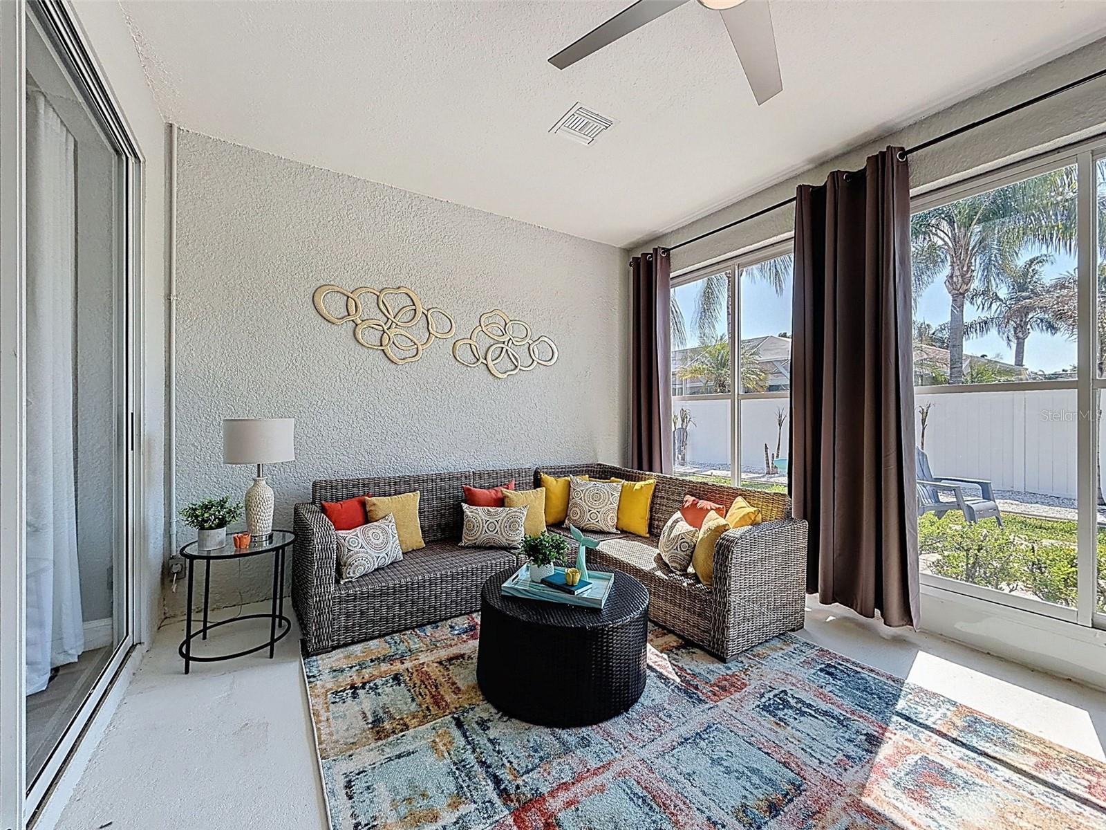 Another view of the Florida Room looking out to the spacious private back yard.