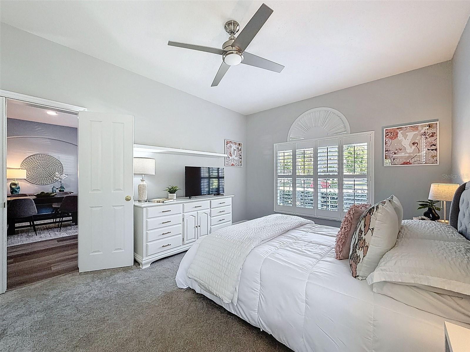 Extra large front bedroom is secluded away from the other bedrooms.  Can be used as bedroom, office or anything you like.  New carpet, fan and plantation shutters.
