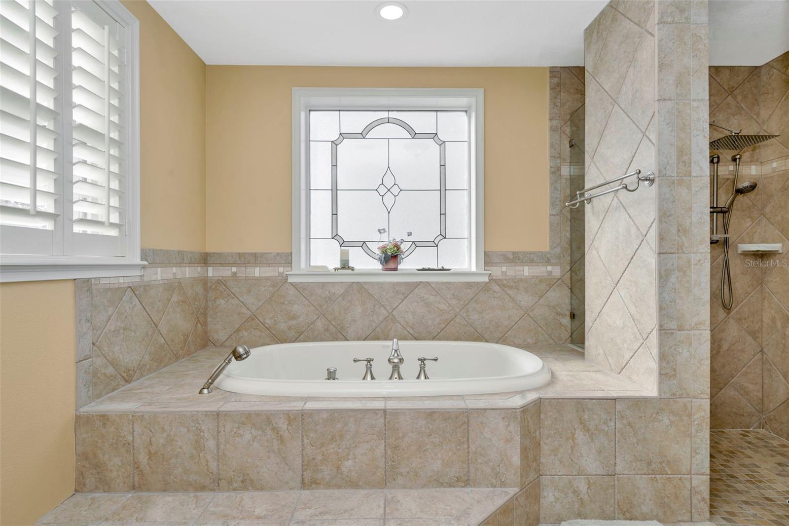 Large tub in primary bathroom.