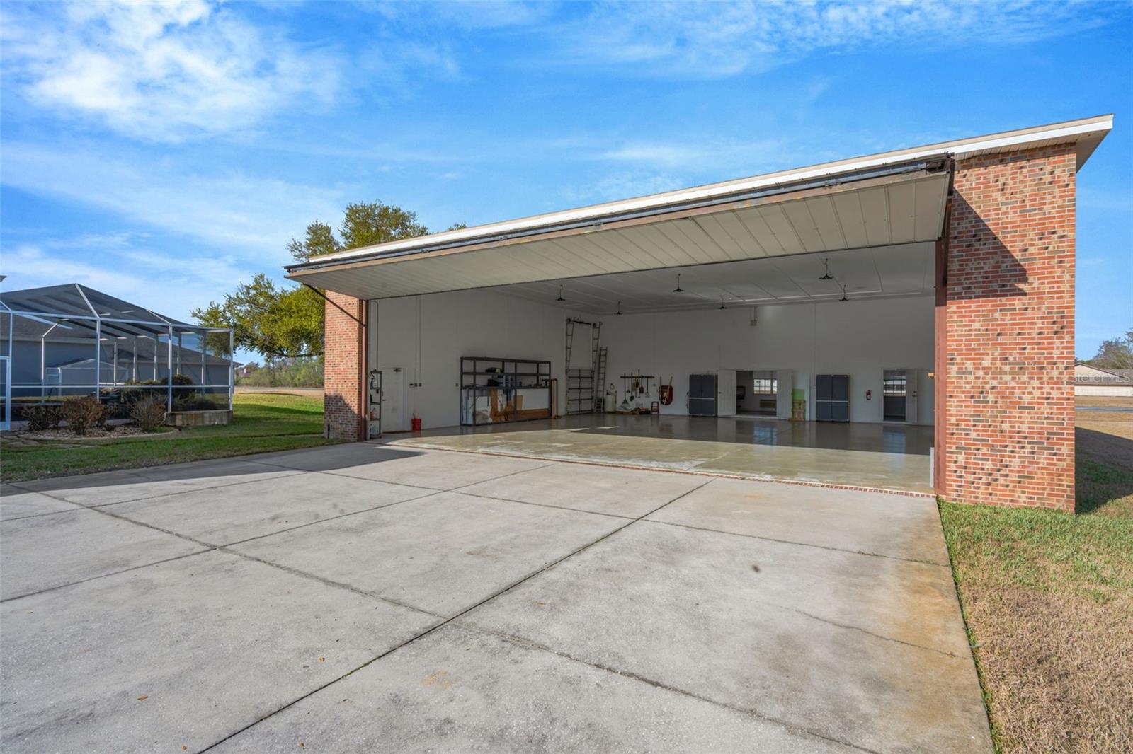 42x14 Electric Hi-Fold Hangar Door.