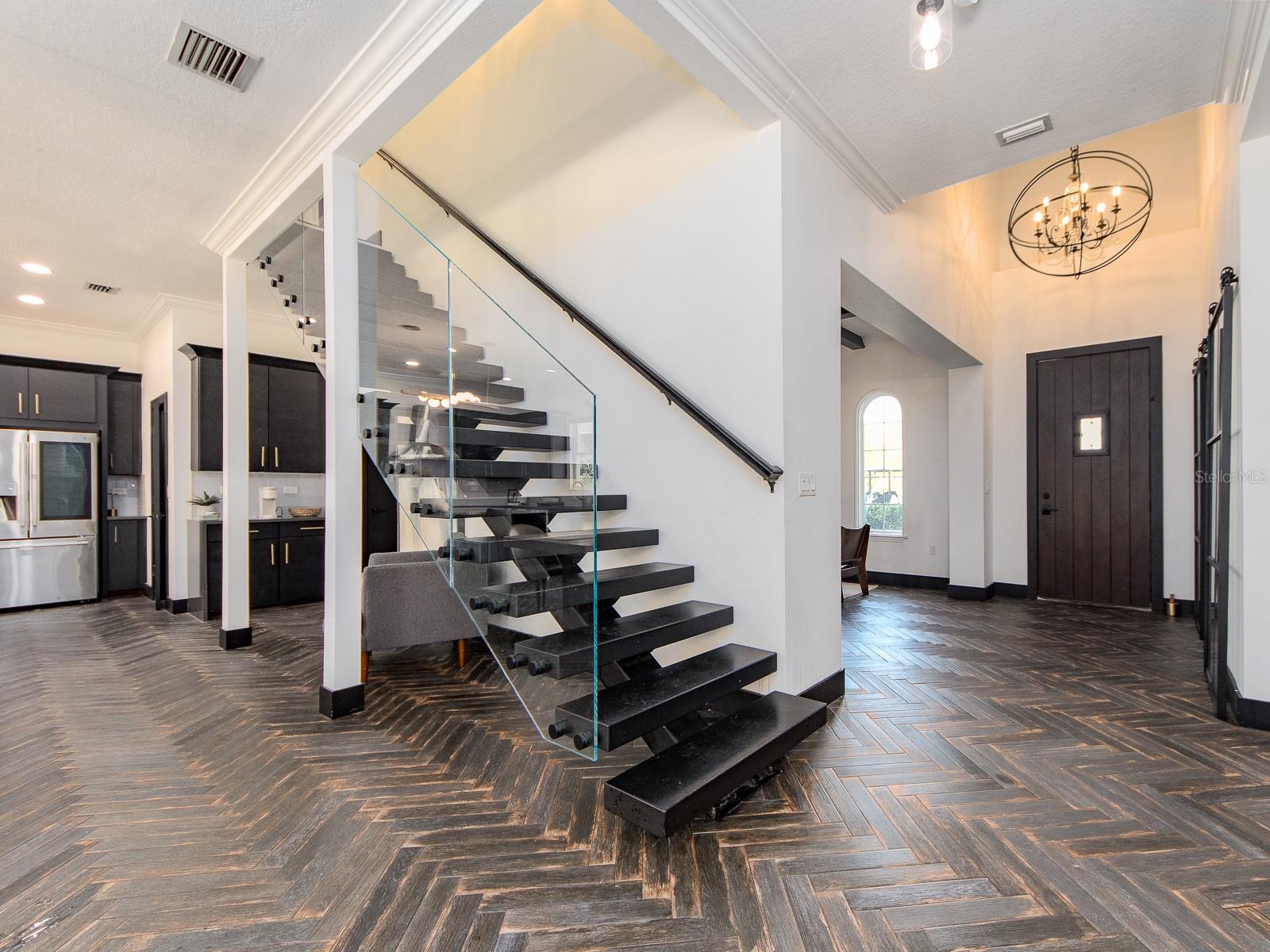 Grand Entry with Floating Staircase