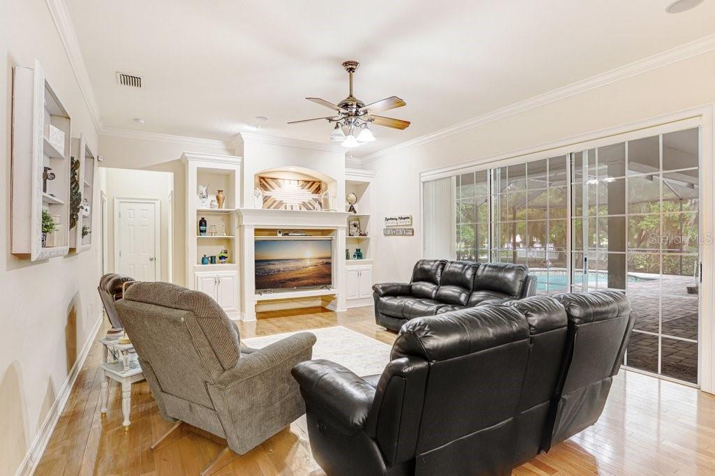 Family room with triple sliding doors