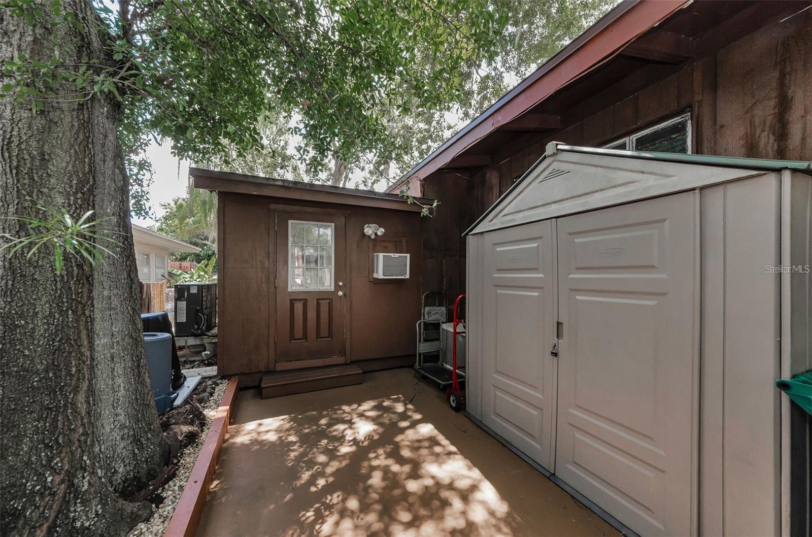 Side yard in front of Carport