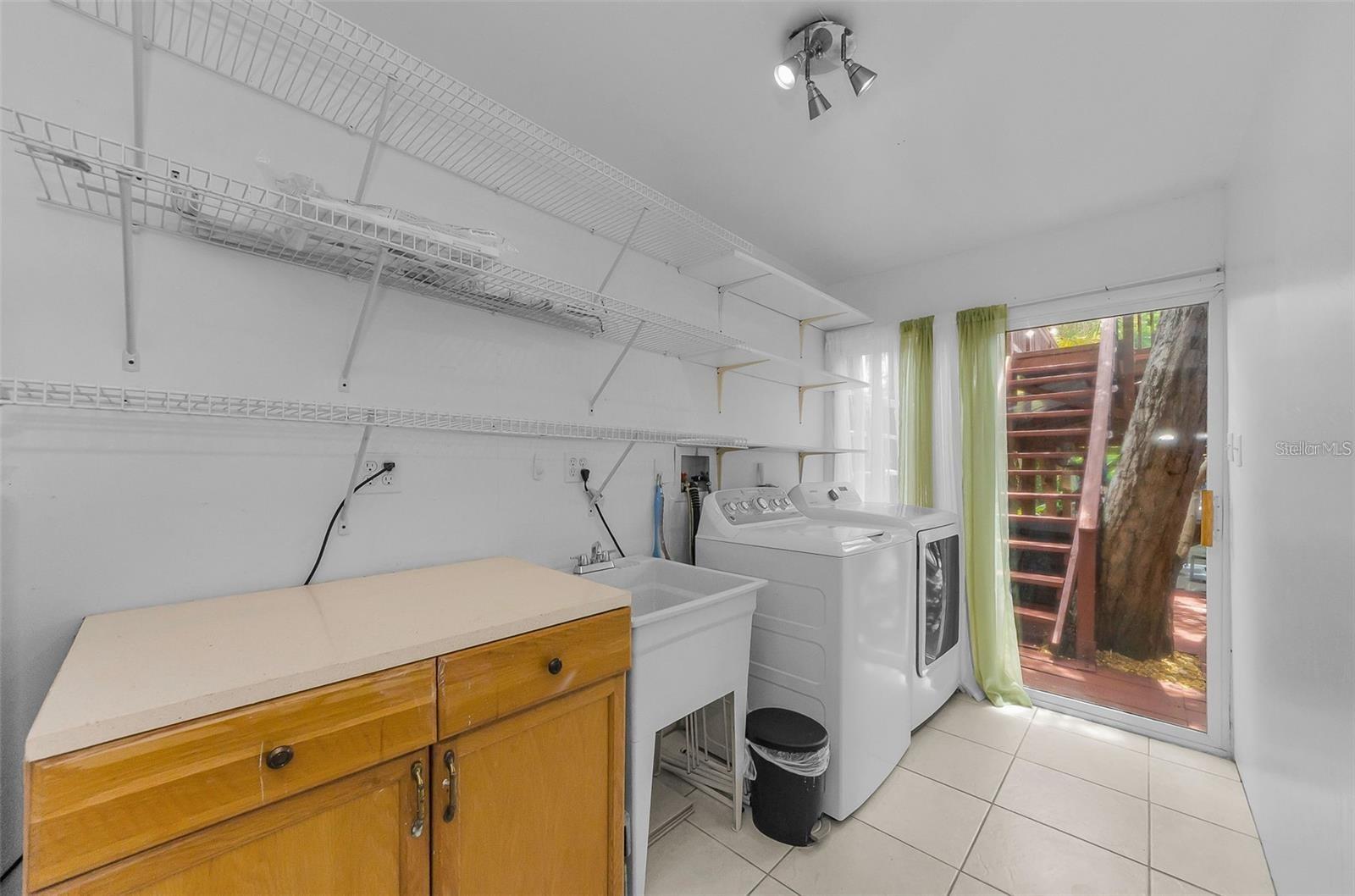 Laundry Room with slider leading to back deck