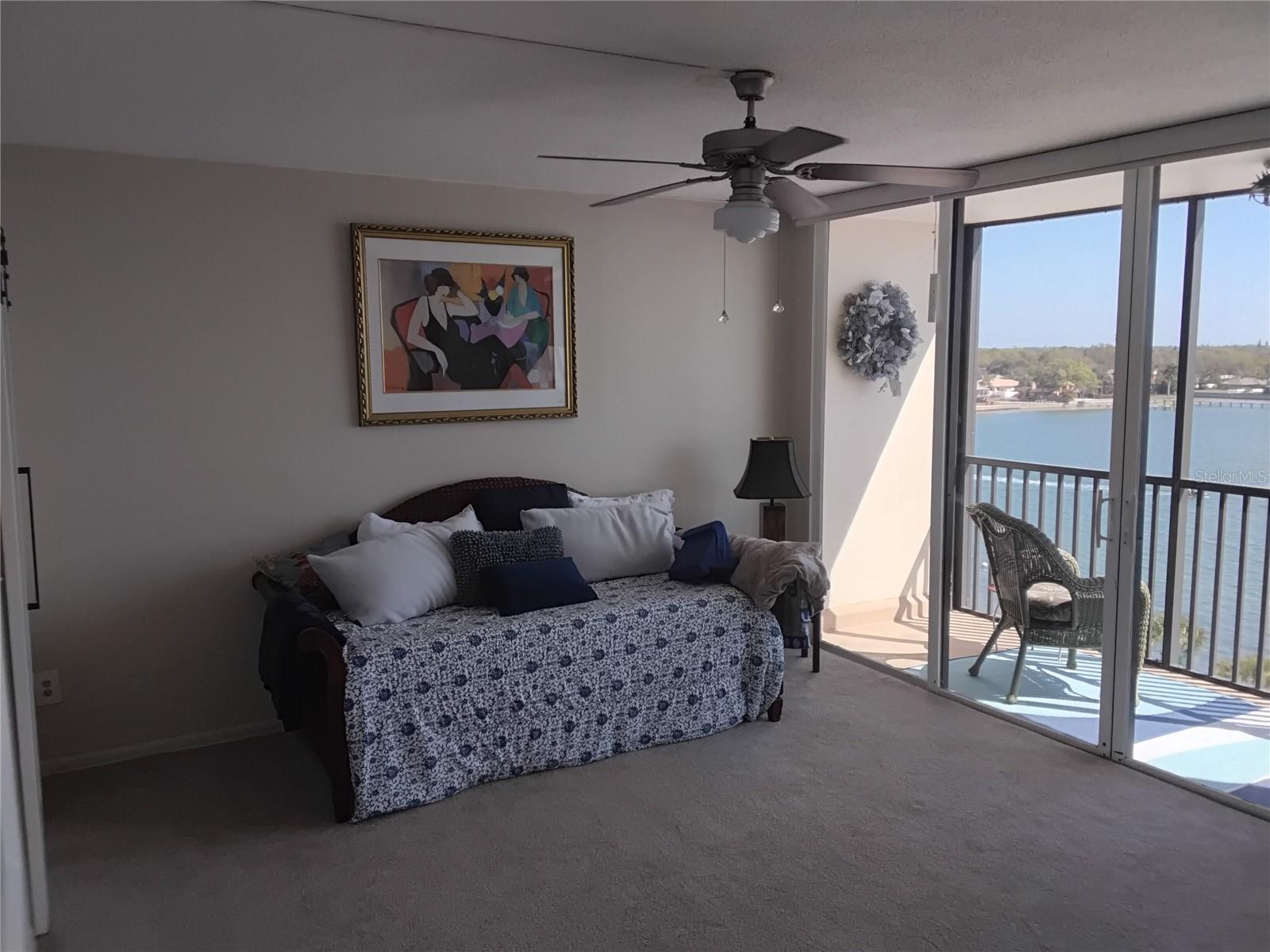 Bedroom 2 with private screened balcony
