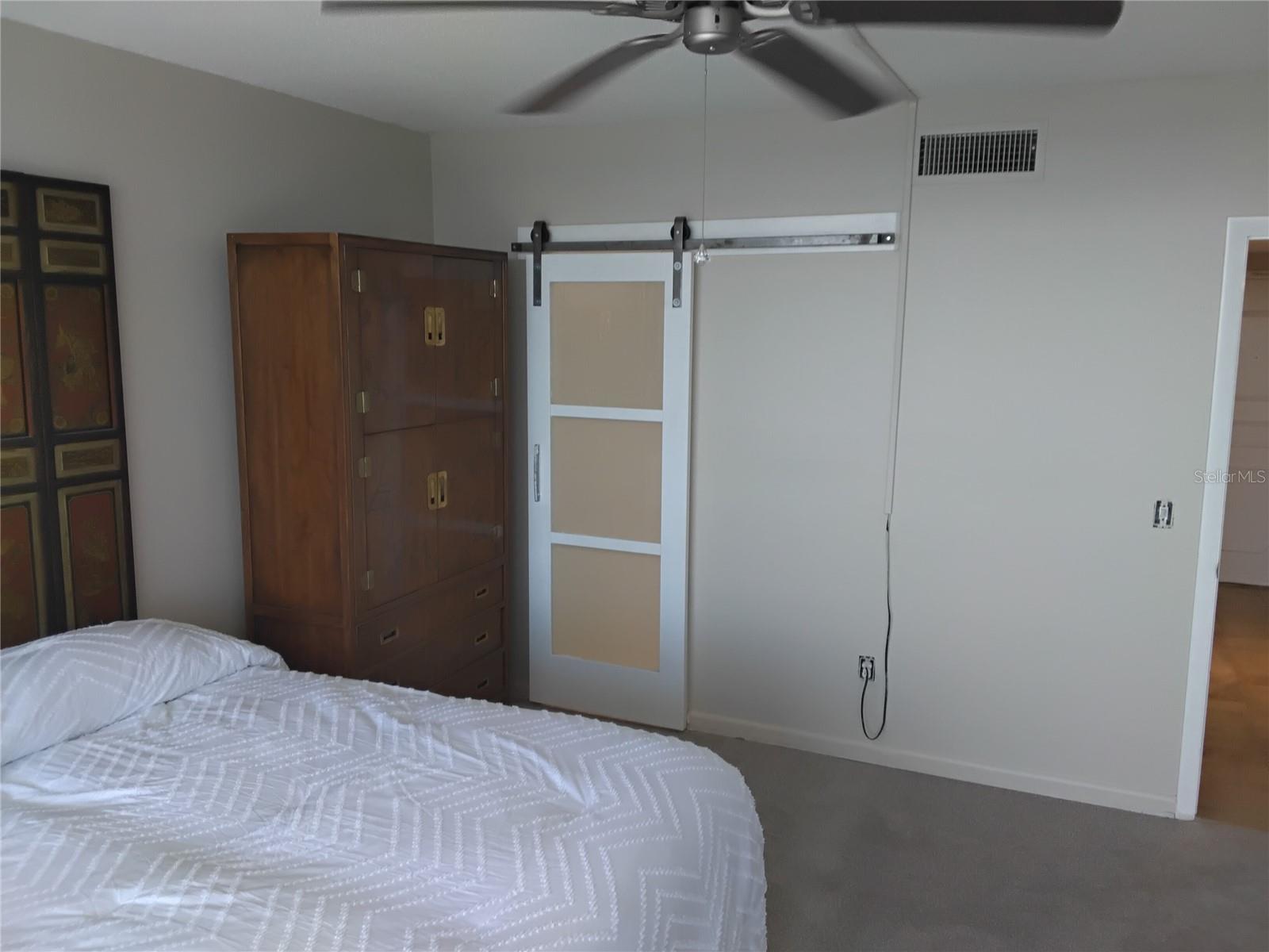 Primary ensuite Bathroom  w/ Barndoor accessibility
