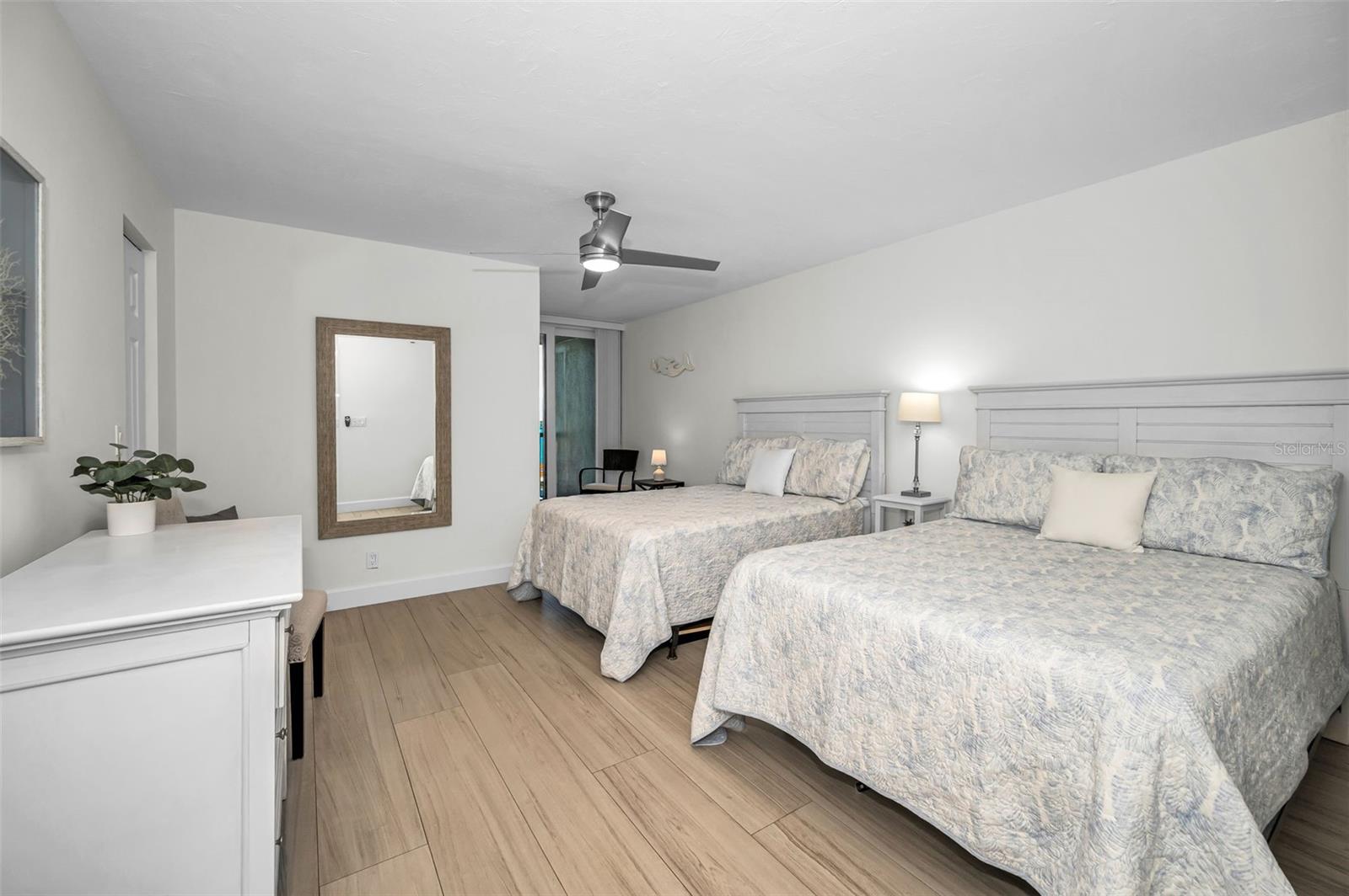 Privately situated second bedroom tucked on the opposite wing