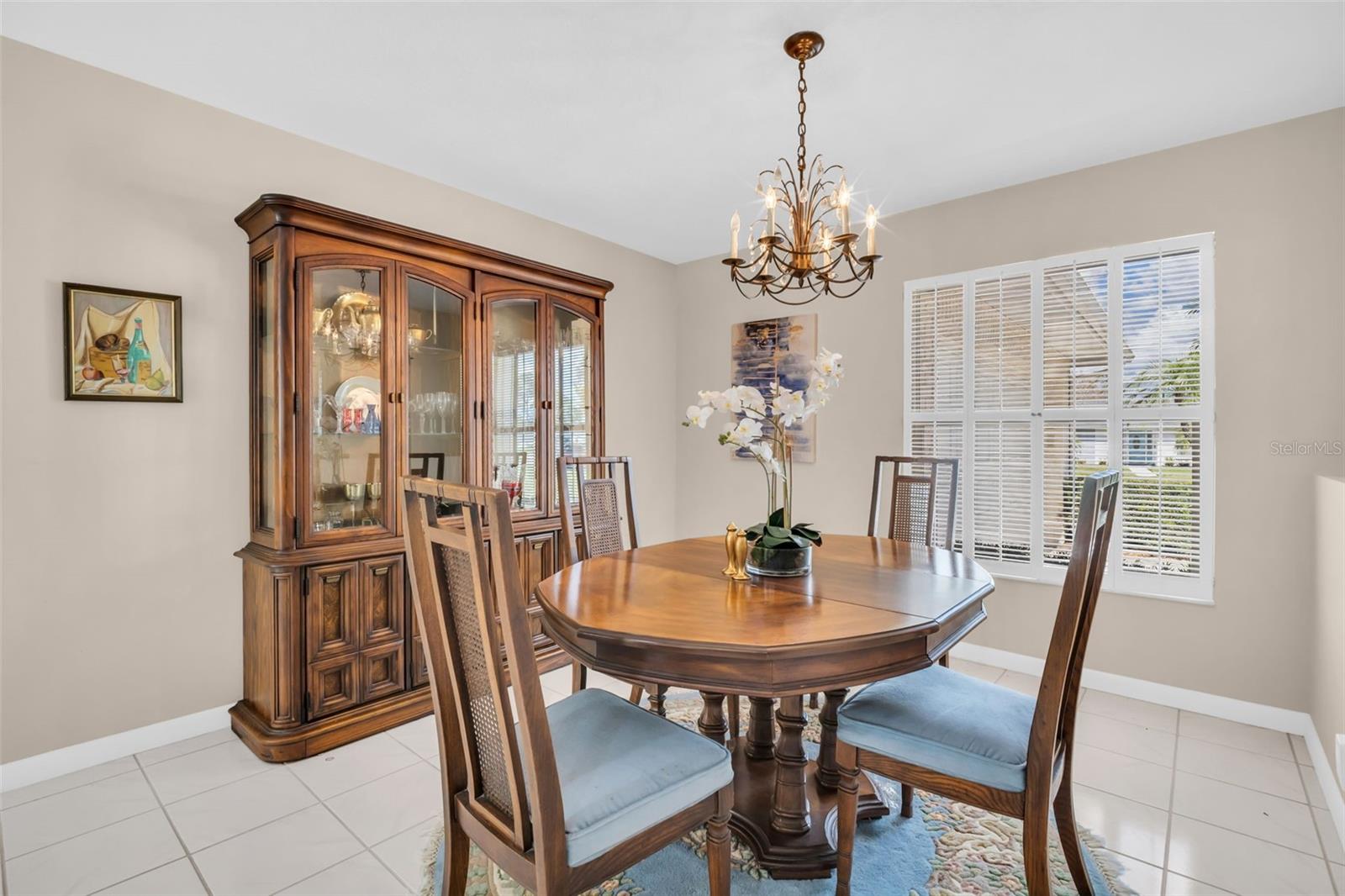 Updated windows and elegant wood shutters~