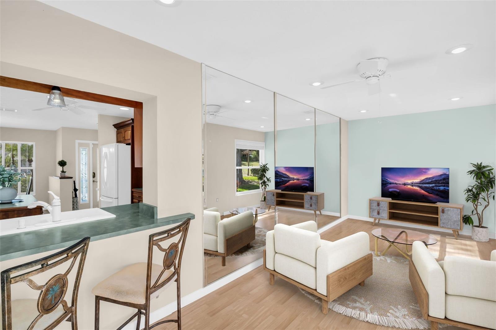 Bar top seating in the family room to the kitchen~