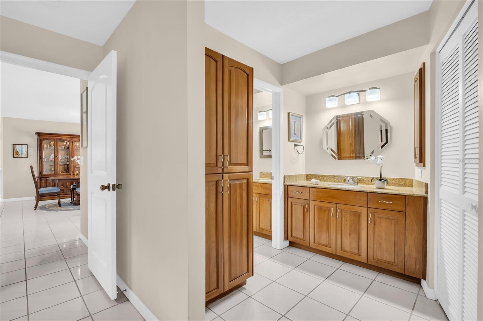 Updated solid-wood cabinetry, granite countertops, and updated lighting~