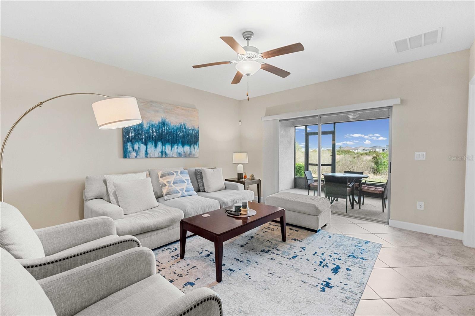 Family Room with sliders to the screen lanai