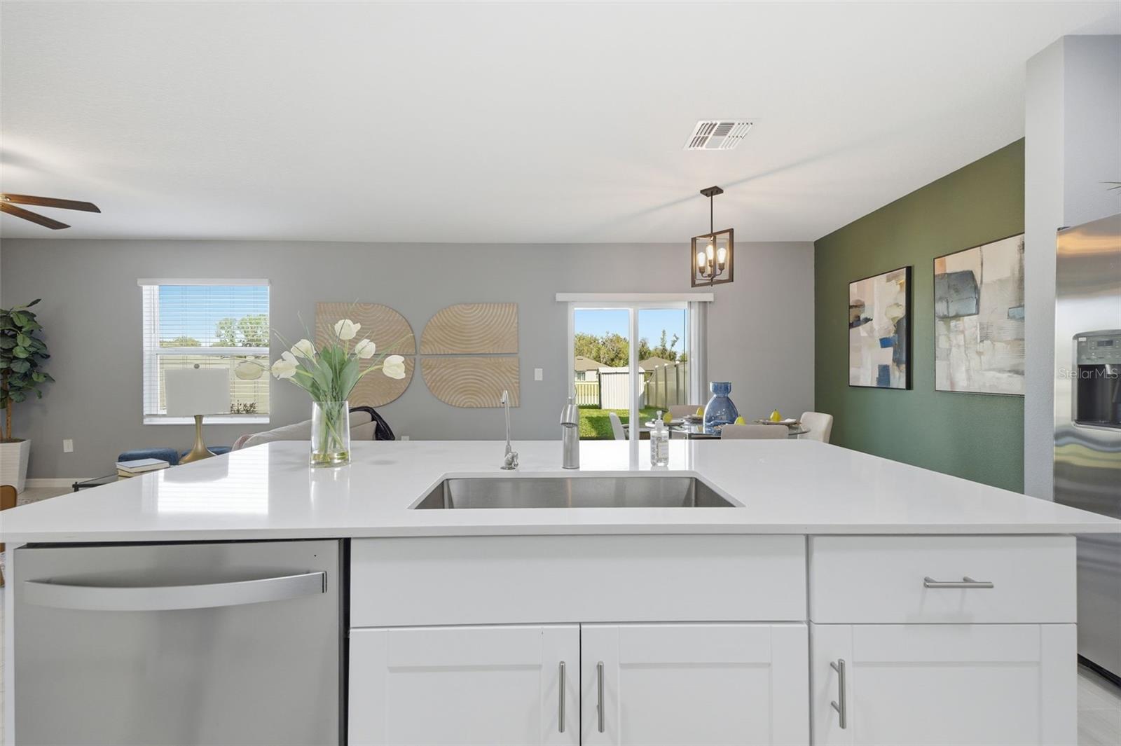 Oversized island with view of dining room