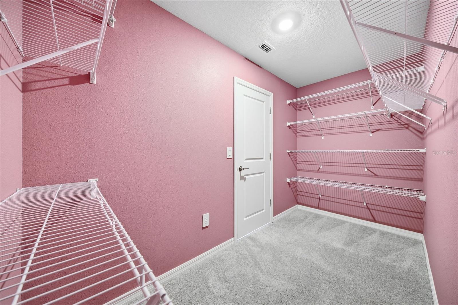 Primary Bedroom walkin closet