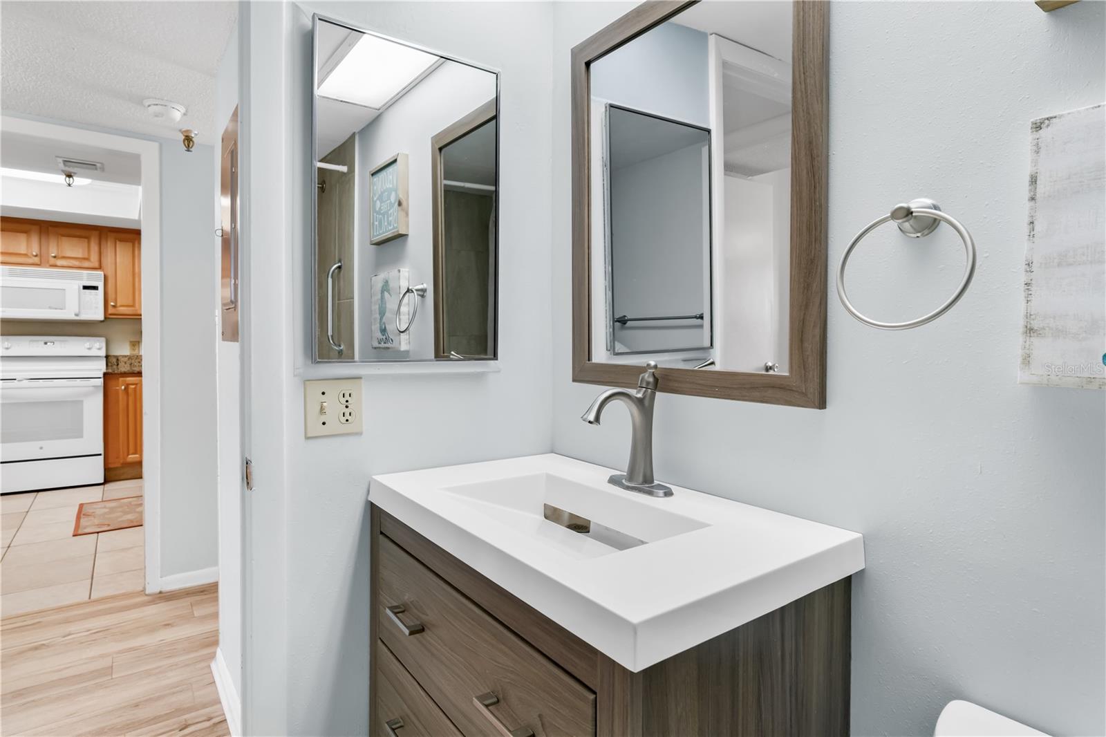Bathroom 2 with stone vanity with tub/shower combo