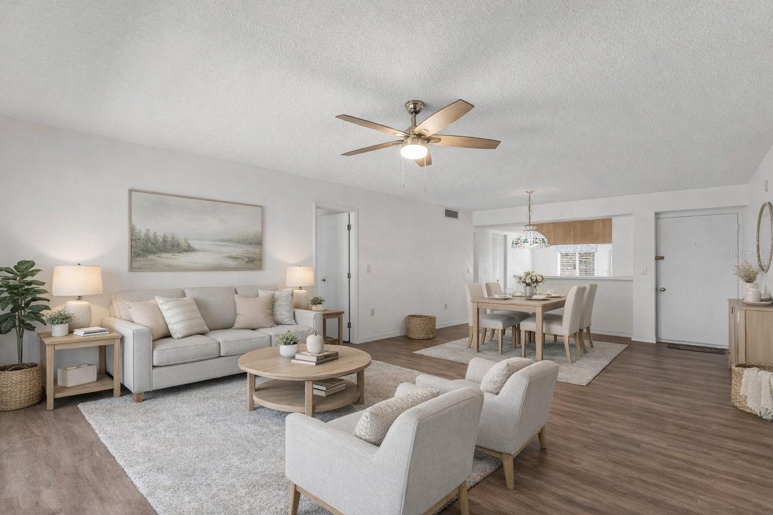 VIRTUALLY STAGED LIVING AND DINING AREA
