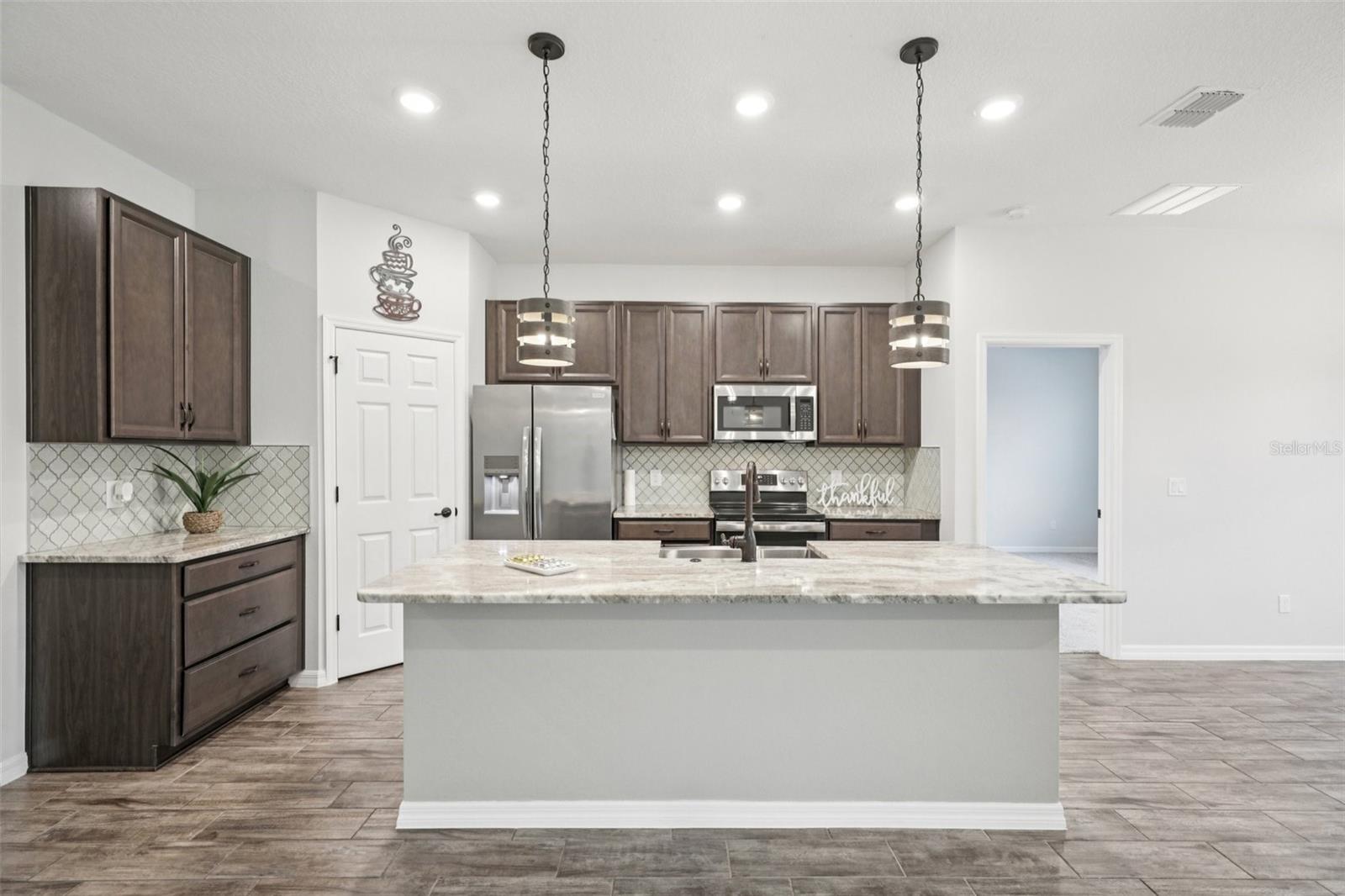 3360 CURLEW AVE, LEESBURG, FL, 34748