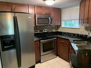 1948 LAKE ATRIUMS CIR #115, ORLANDO, FL, 32839