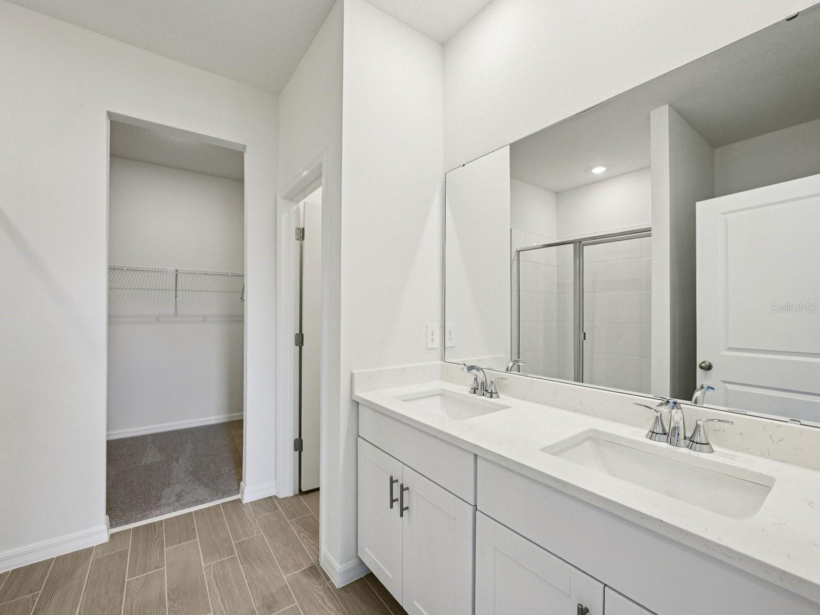 Interior photos are not of the actual home but are photos of the builder home with the same floorplan with similar interior finishes and features.