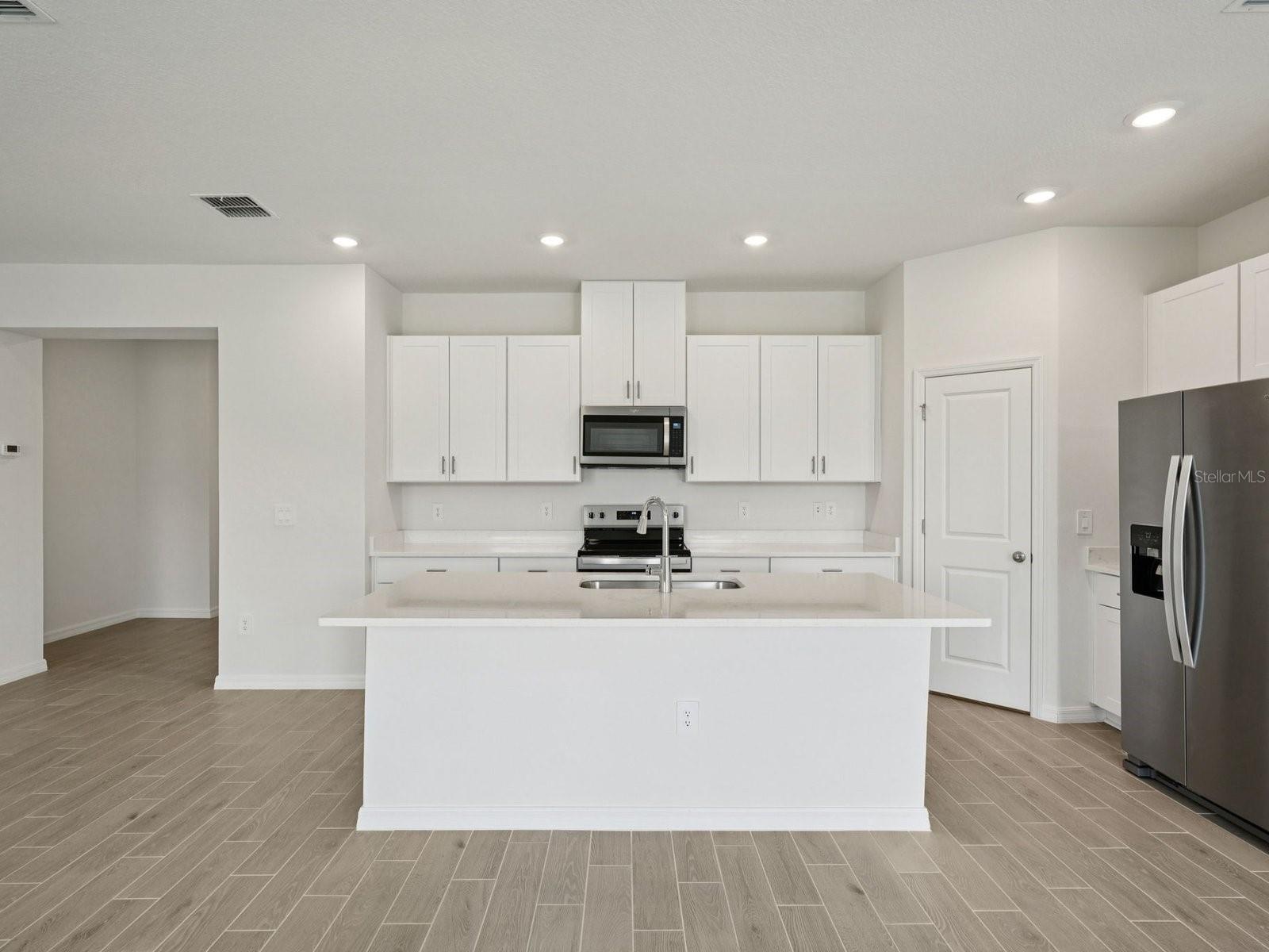 Interior photos are not of the actual home but are photos of the builder home with the same floorplan with similar interior finishes and features.