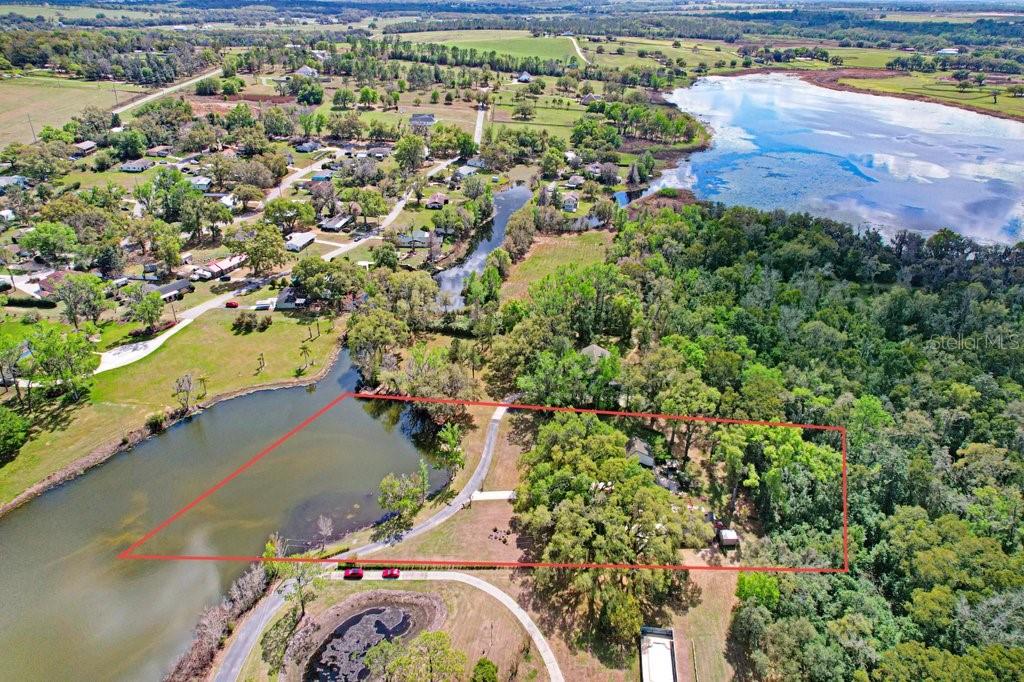 Property boundary lines in red are approximate