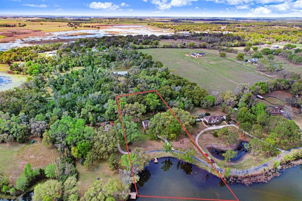 Property boundary lines in red are approximate