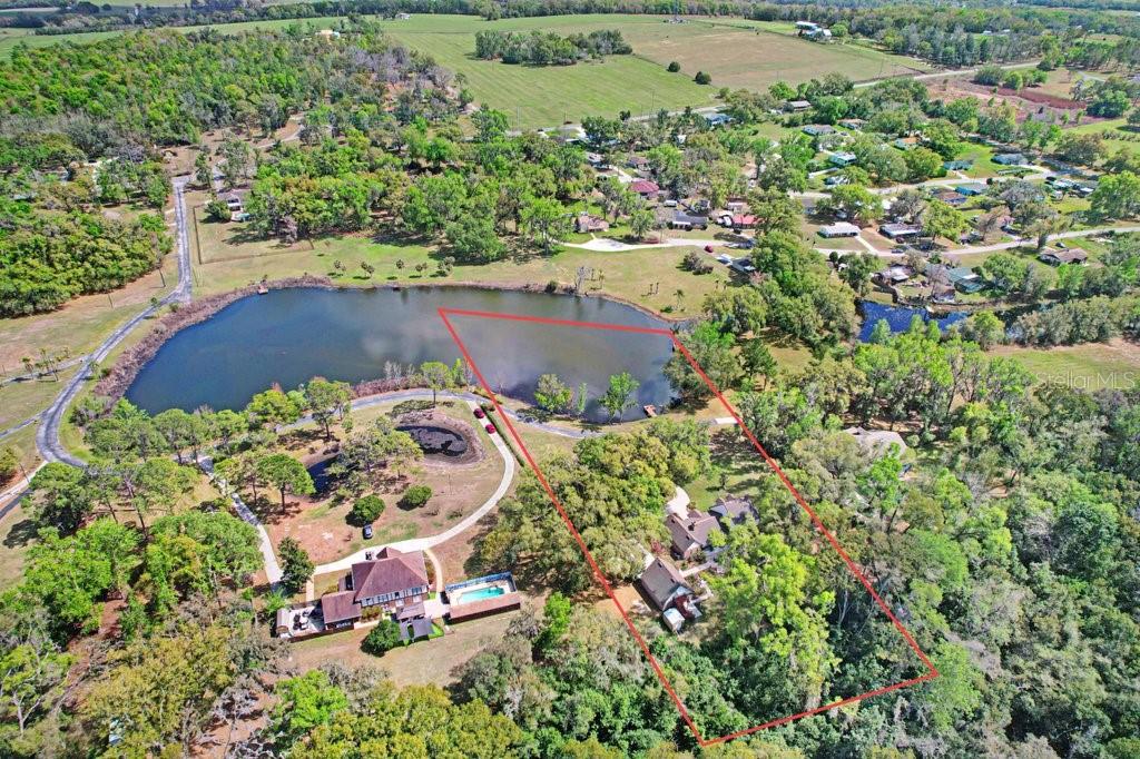 Property boundary lines in red are approximate