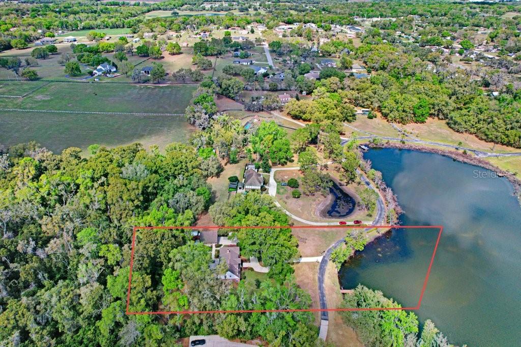 Property boundary lines in red are approximate