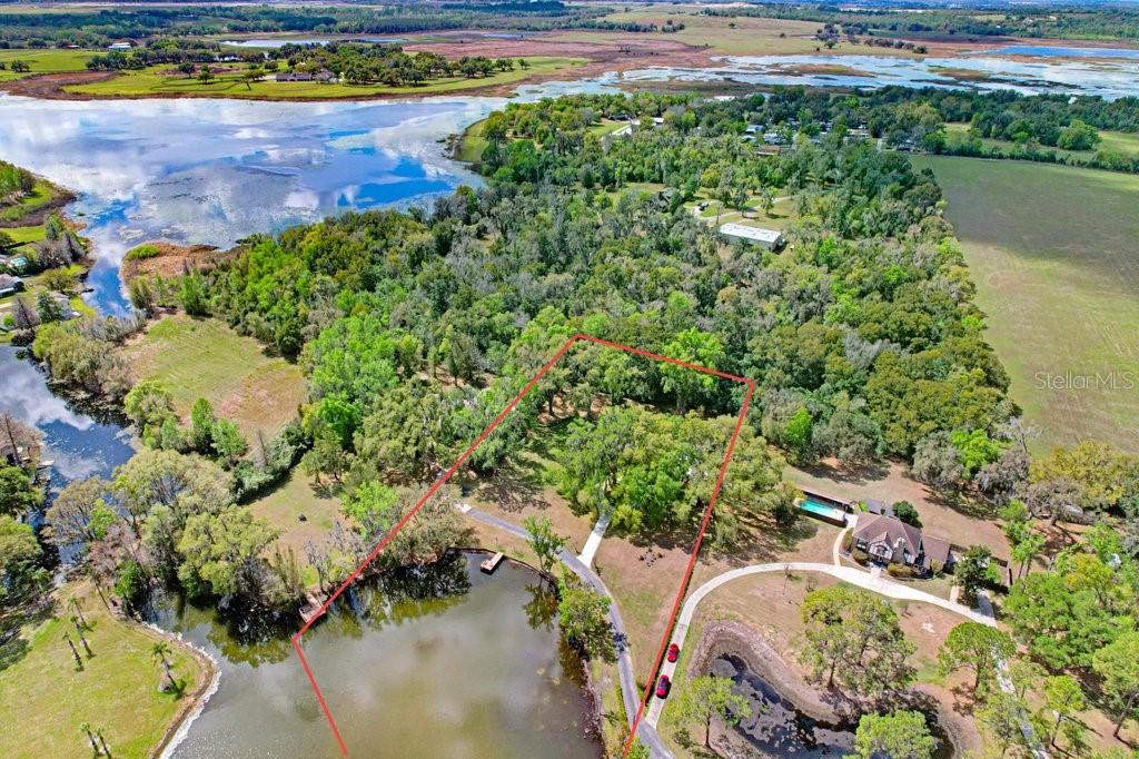 Property boundary lines in red are approximate