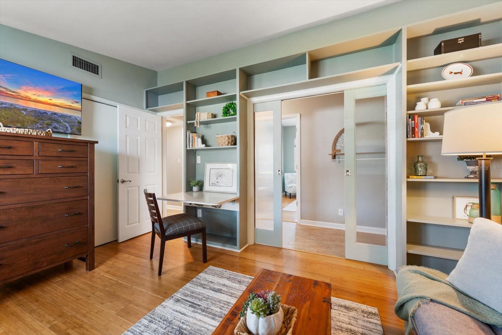 Second bedroom with timeless built-ins.