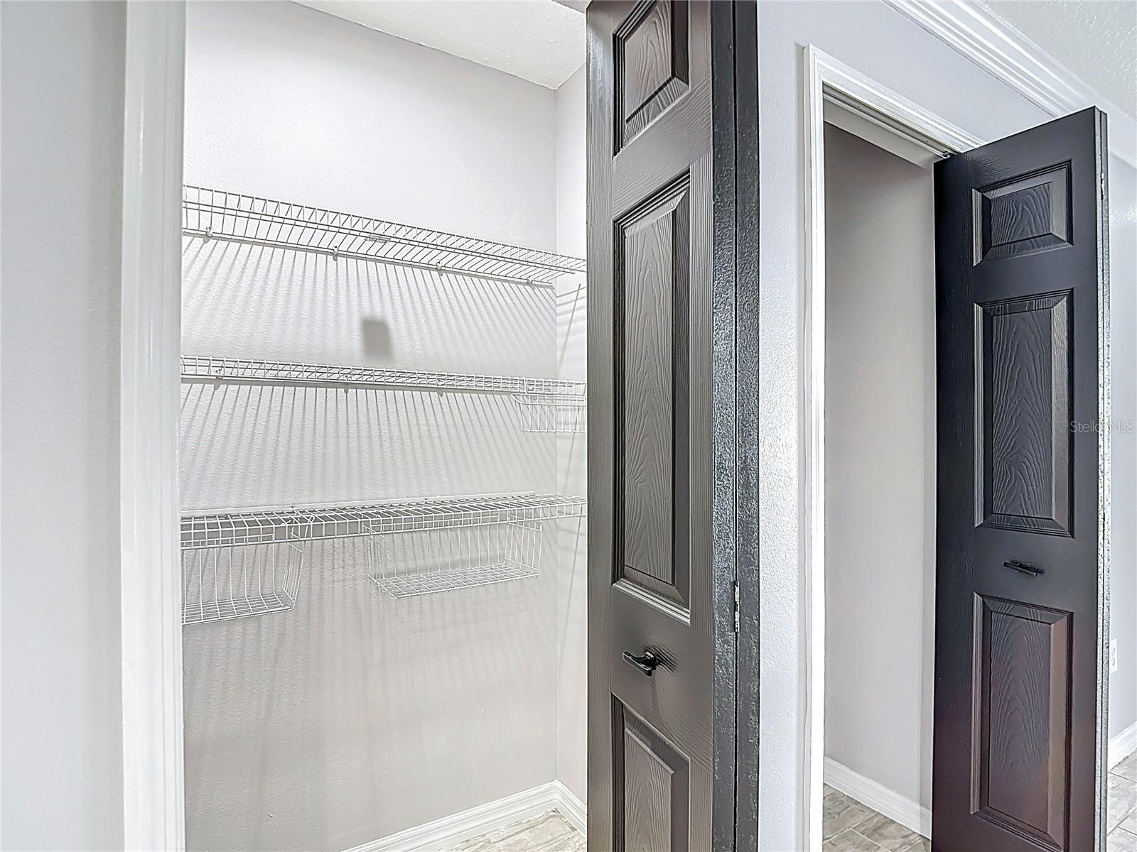 Pantry off kitchen And extra storage closet