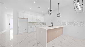 1009/1011 NE 15TH LN, CAPE CORAL, FL, 33909