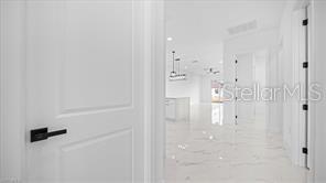 1009/1011 NE 15TH LN, CAPE CORAL, FL, 33909