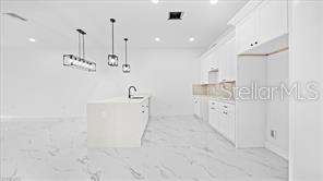 1009/1011 NE 15TH LN, CAPE CORAL, FL, 33909